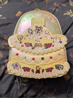 Loungefly Iridescent Yellow & Pink Beauty Cake Mini Backpack